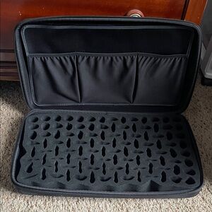 Blue Storage Case with Foam Insert and it can hold body oils.